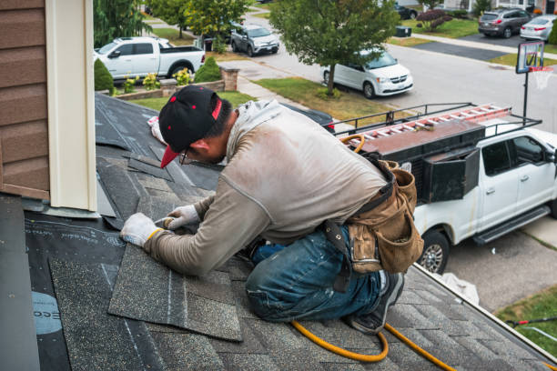 Professional Roofing technician working in Aurora, UT